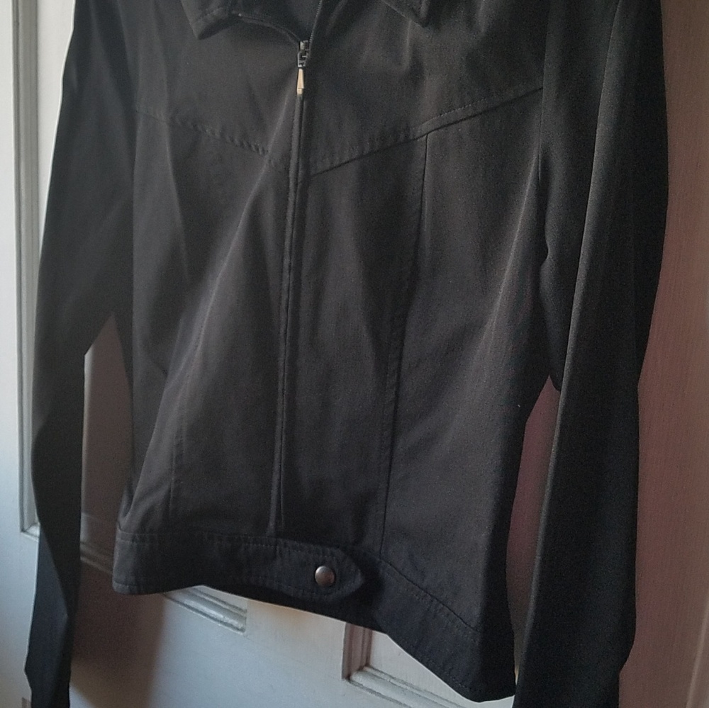 Black zip up jacket.
